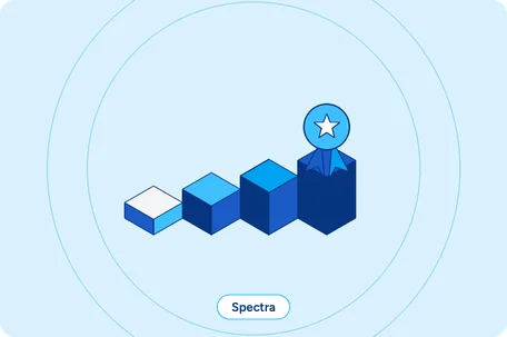 Isometric illustration of four ascending certification steps with an award rosette on the highest, representing the Spectra Approved tier and Levels 1 to 3